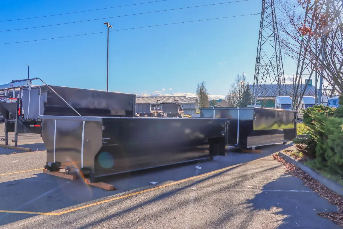 Roll-off dumpster ready for waste disposal at job site for Demolition Dumpster Rental in Pomfret